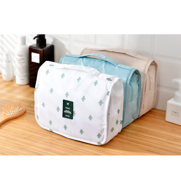 Travel Toiletry Case With Hanging Feature And Waterproof Exterior