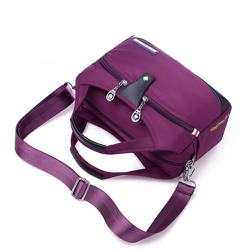 Geantă crossbody antifurt din nailon — design hidrofug, compartimente multiple, funcții de securitate ascunse