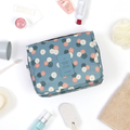 Travel Toiletry Case With Hanging Feature And Waterproof Exterior