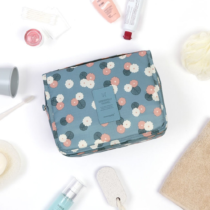 Travel Toiletry Case With Hanging Feature And Waterproof Exterior