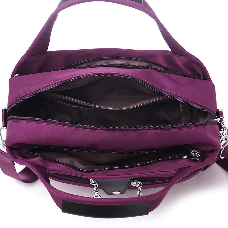 Geantă crossbody antifurt din nailon — design hidrofug, compartimente multiple, funcții de securitate ascunse