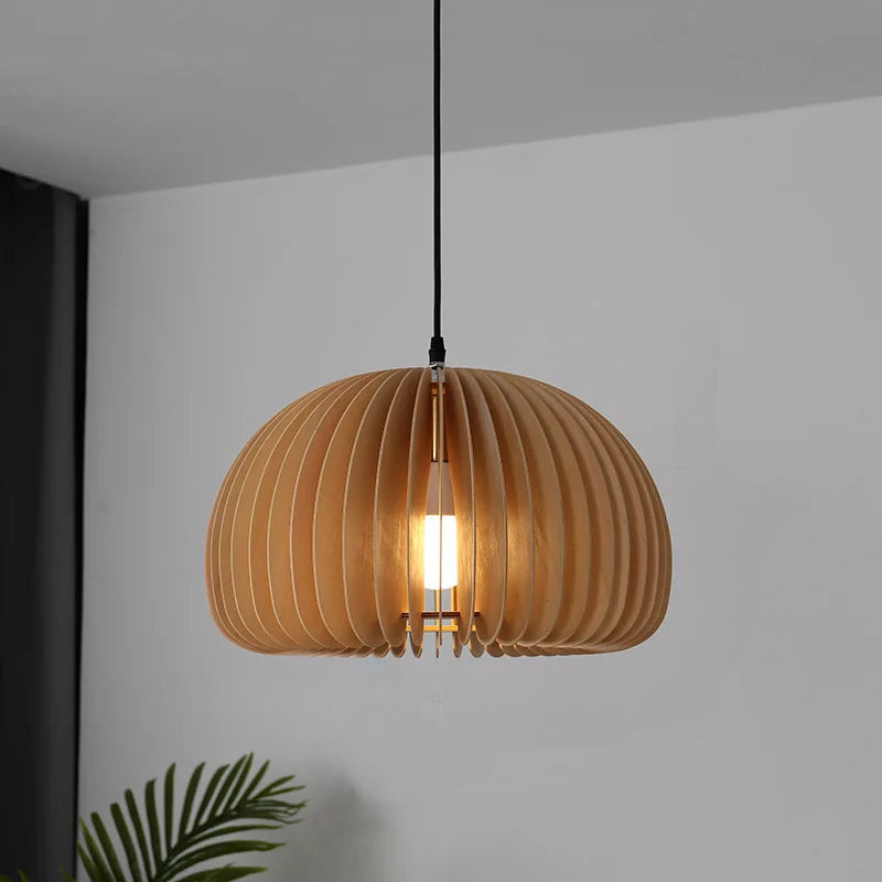 Wooden Pendant Lamp With Sculpted Rounded Shade For Warm Indoor Lighting In Minimalist Spaces