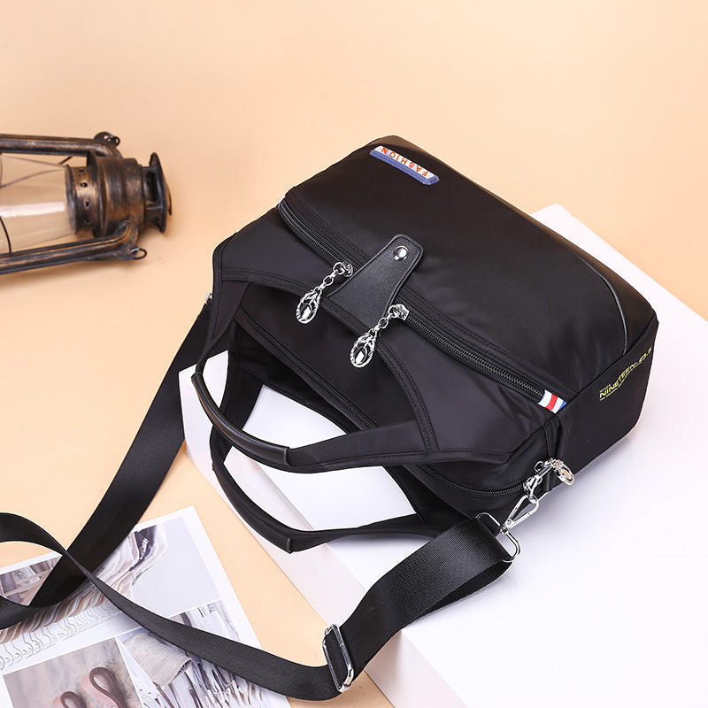 Geantă crossbody antifurt din nailon — design hidrofug, compartimente multiple, funcții de securitate ascunse