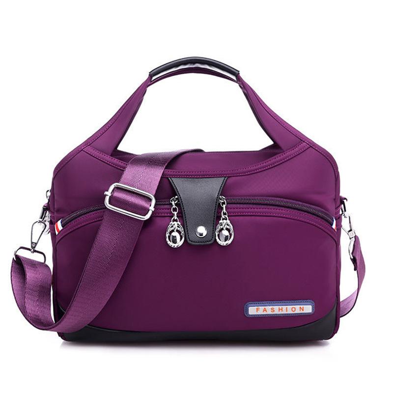 Geantă crossbody antifurt din nailon — design hidrofug, compartimente multiple, funcții de securitate ascunse