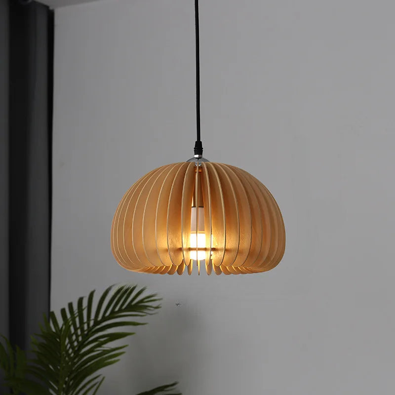 Wooden Pendant Lamp With Sculpted Rounded Shade For Warm Indoor Lighting In Minimalist Spaces