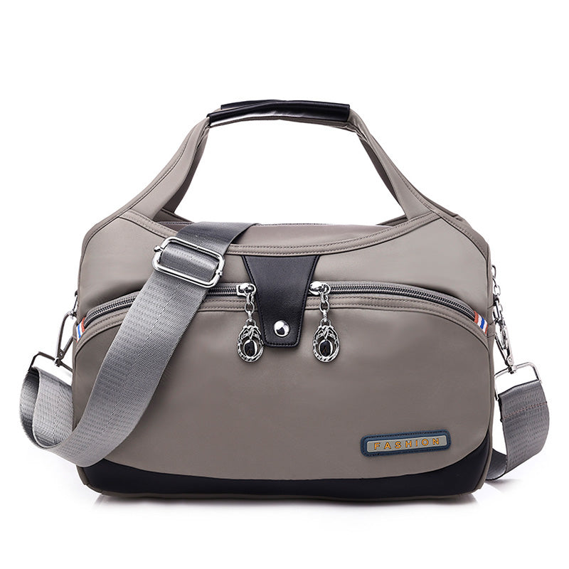Geantă crossbody antifurt din nailon — design hidrofug, compartimente multiple, funcții de securitate ascunse