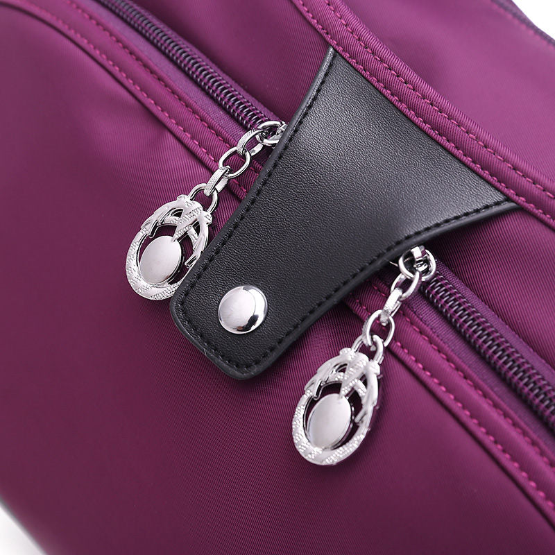 Geantă crossbody antifurt din nailon — design hidrofug, compartimente multiple, funcții de securitate ascunse