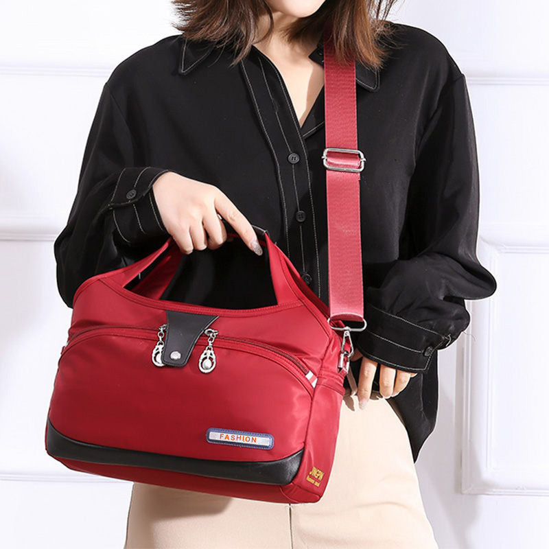 Geantă crossbody antifurt din nailon — design hidrofug, compartimente multiple, funcții de securitate ascunse