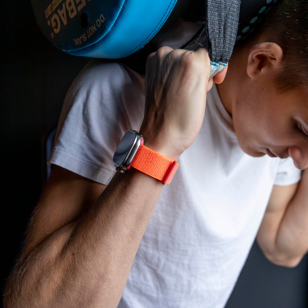 Orangefärgat vävt nylonarmband för Apple Watch