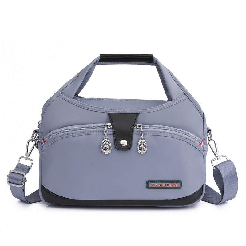 Geantă crossbody antifurt din nailon — design hidrofug, compartimente multiple, funcții de securitate ascunse