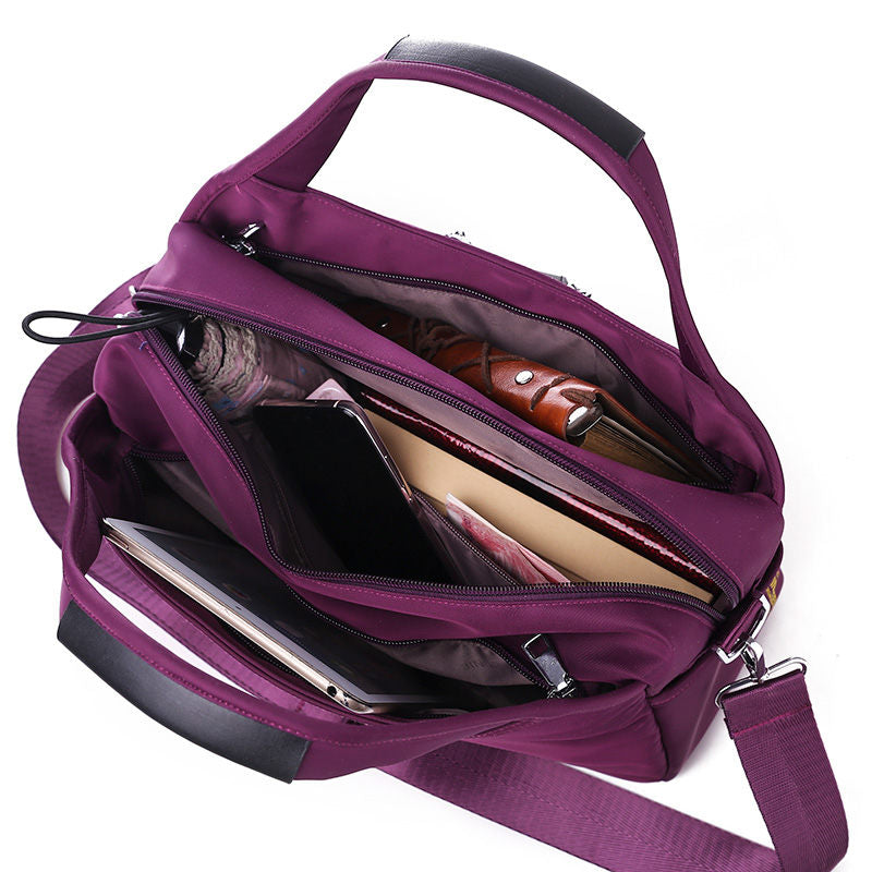 Geantă crossbody antifurt din nailon — design hidrofug, compartimente multiple, funcții de securitate ascunse