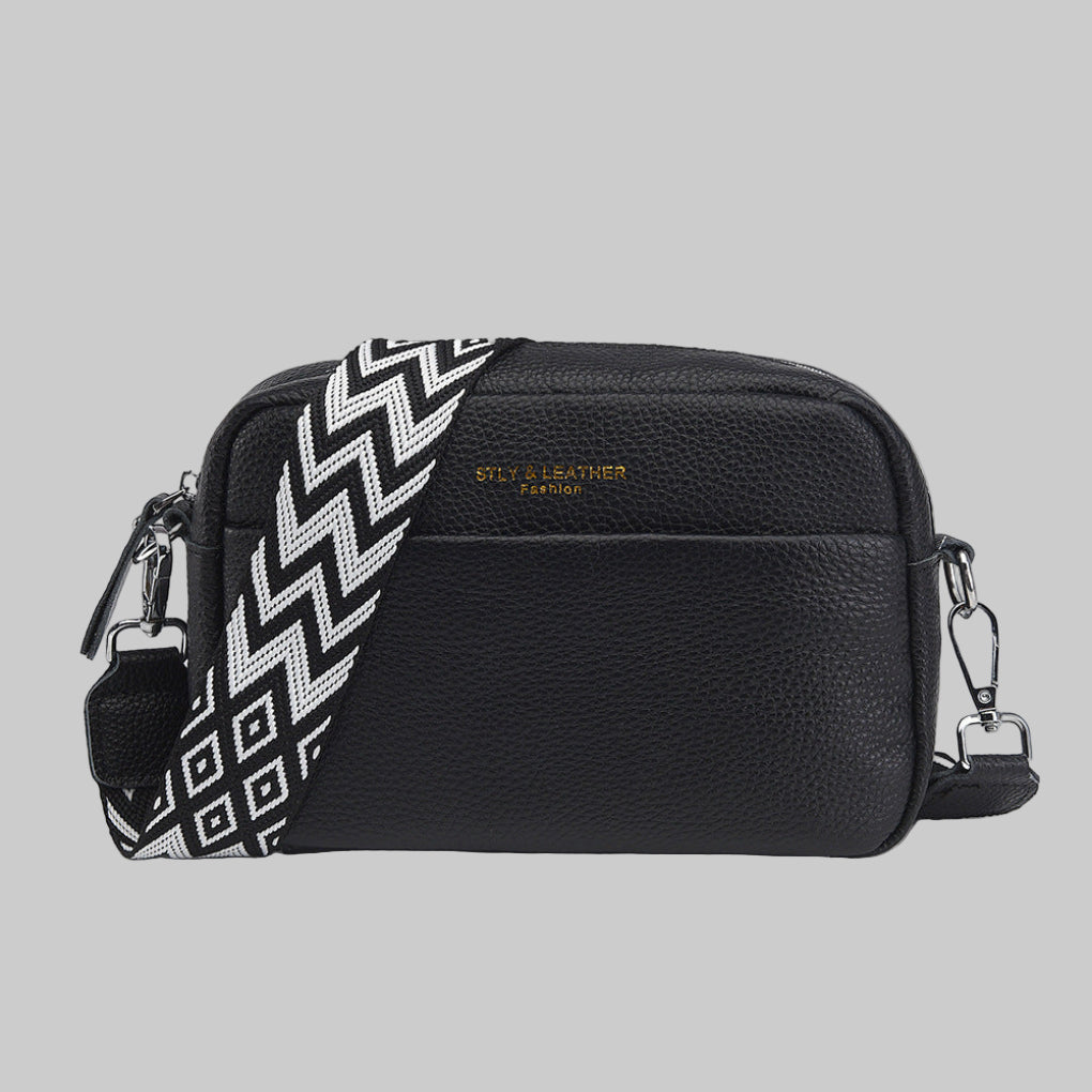 Sac bandoulière en cuir — Bandoulière à motifs, silhouette structurée