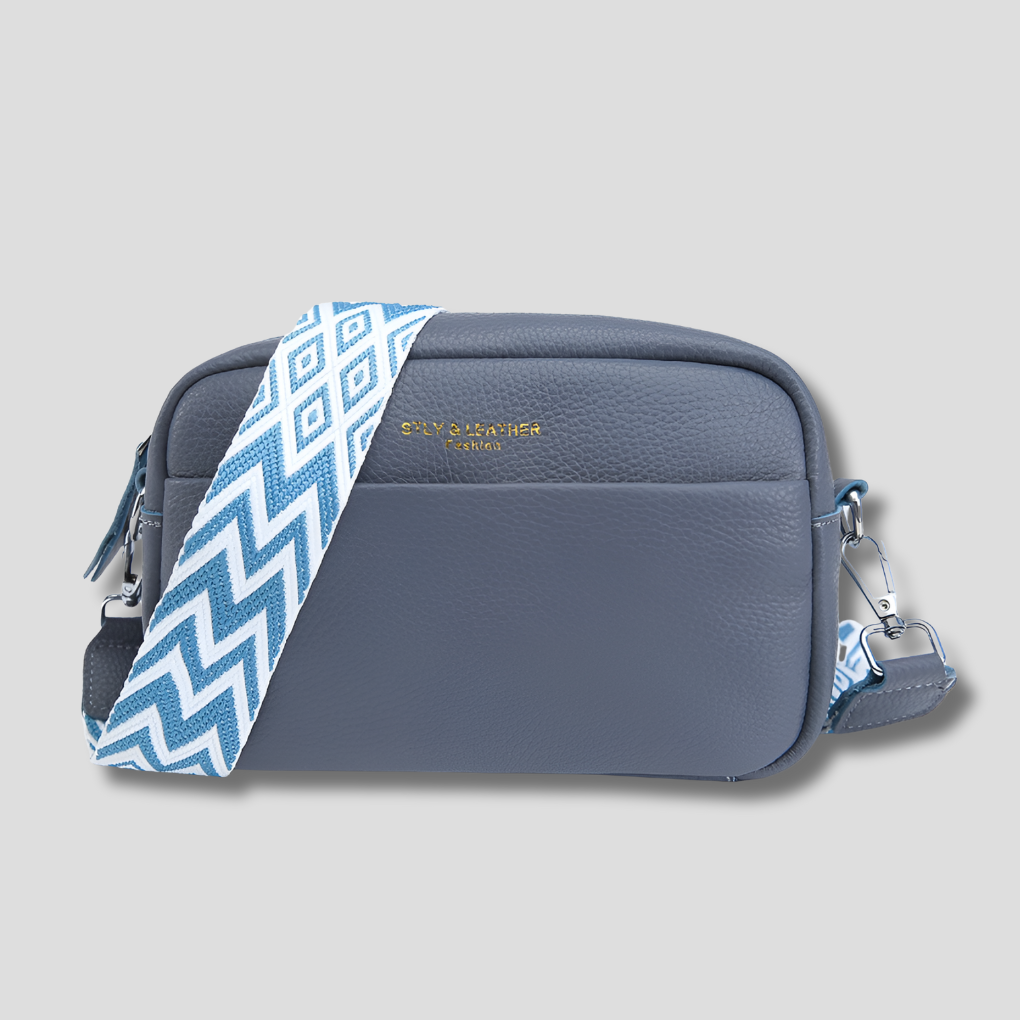 Sac bandoulière en cuir — Bandoulière à motifs, silhouette structurée