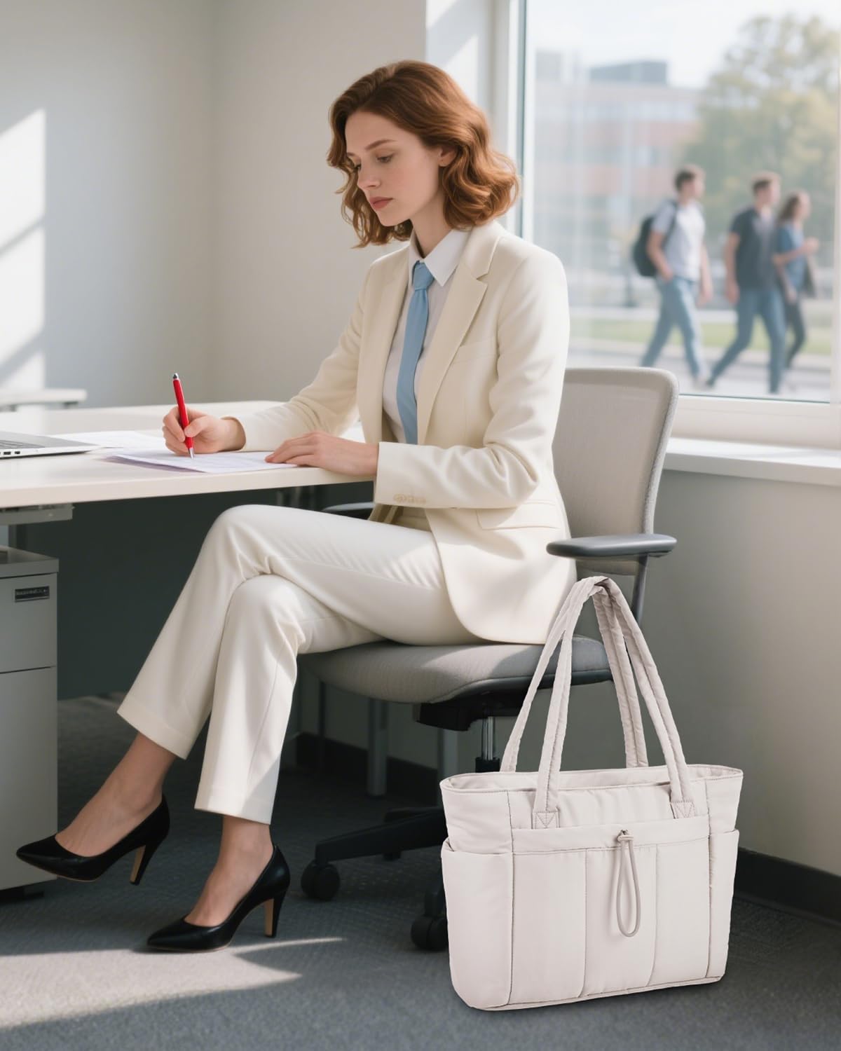 Puffer-taske med 20 l kapacitet — laptoprum og kopholder