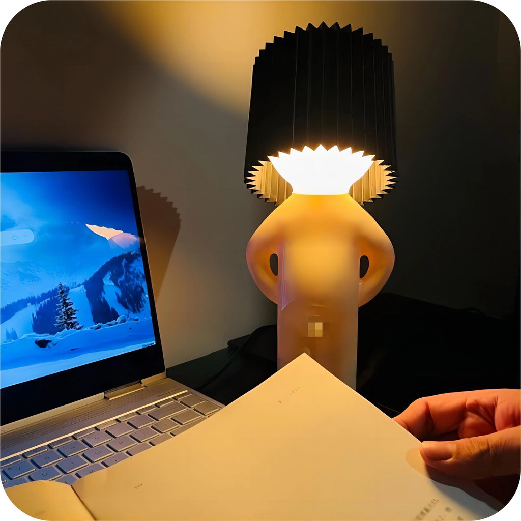 Finurlig bordlampe formet som et menneske – bærbar, batteridrevet lampe