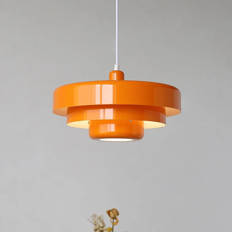 Aureli Tiered Pendant Lamp With Bold Orange White And Forest Green Accents For Modern Living Spaces