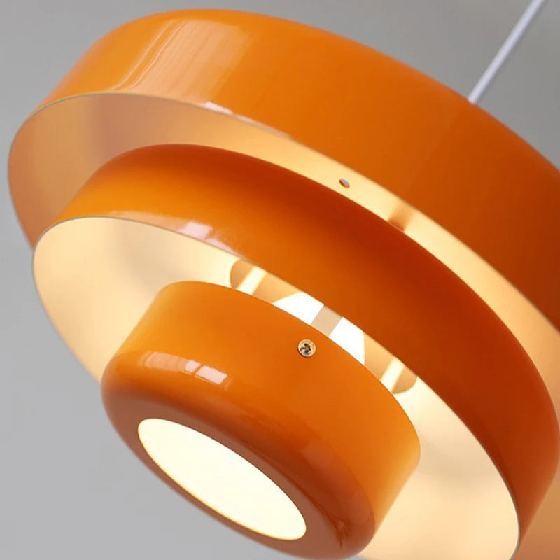 Aureli Tiered Pendant Lamp With Bold Orange White And Forest Green Accents For Modern Living Spaces