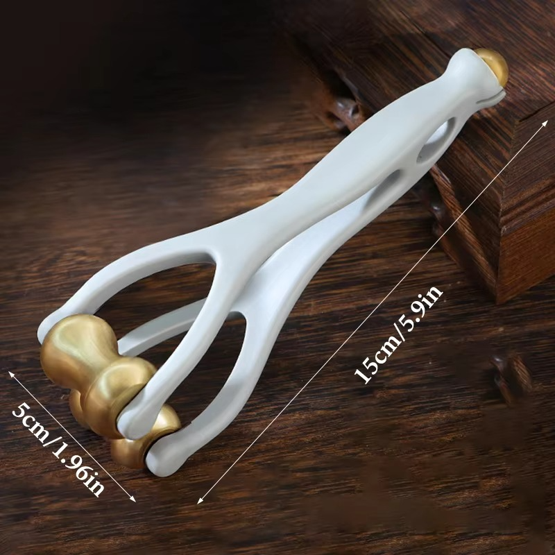 Masseur pour doigts — rouleaux en laiton pour les articulations des doigts