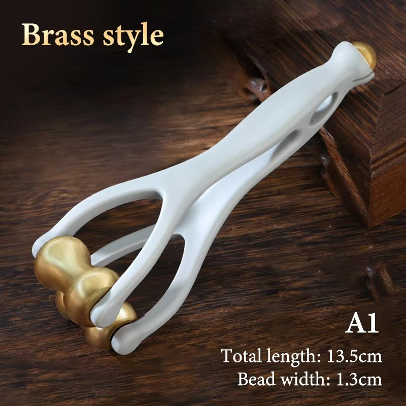 Masseur pour doigts — rouleaux en laiton pour les articulations des doigts