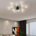 Liora Starburst LED Ceiling Light With Narrow Black Rods And Gentle White Tubes For Modern Interiors