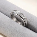 Drehring mit Zirkonia, Titanstahl, 6 mm breit, Silber, Gold oder Roségold -    Zorenza