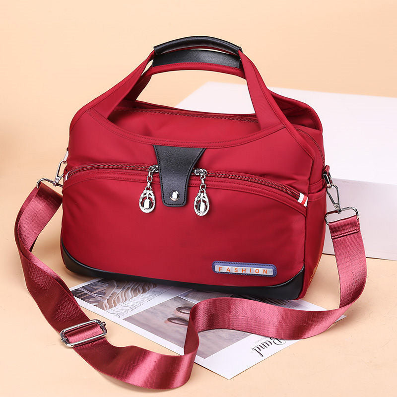 Geantă crossbody antifurt din nailon — design hidrofug, compartimente multiple, funcții de securitate ascunse