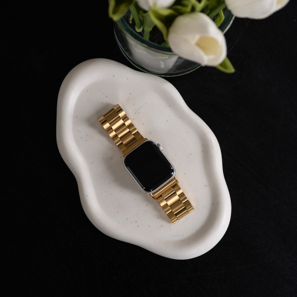 Bracelet doré en acier inoxydable pour Apple Watch — fermoir pliant robuste
