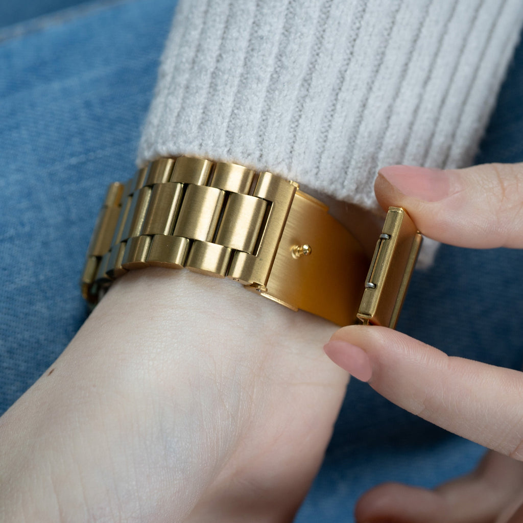 Bracelet doré en acier inoxydable pour Apple Watch — fermoir pliant robuste