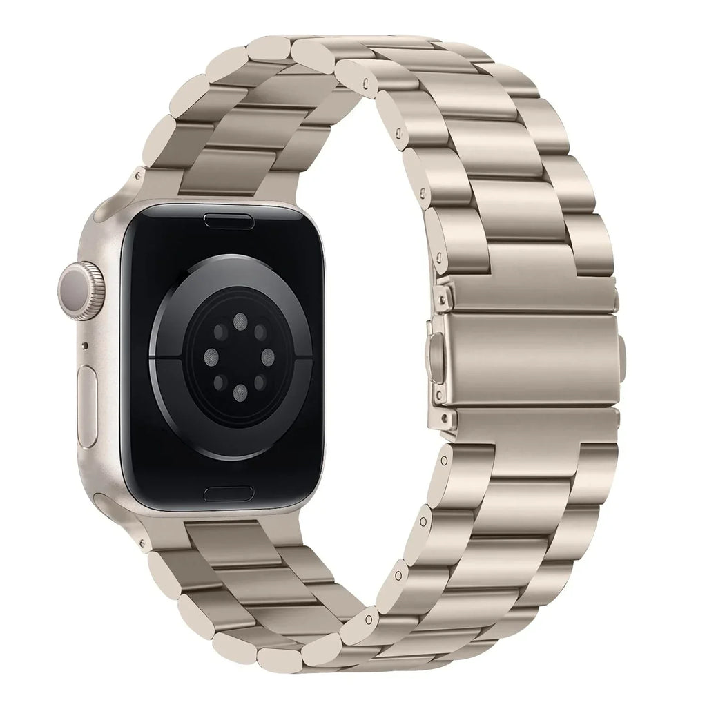 Ocelový řemínek pro Apple Watch v barvě Starlight — propojené články, bezpečná skládací spona