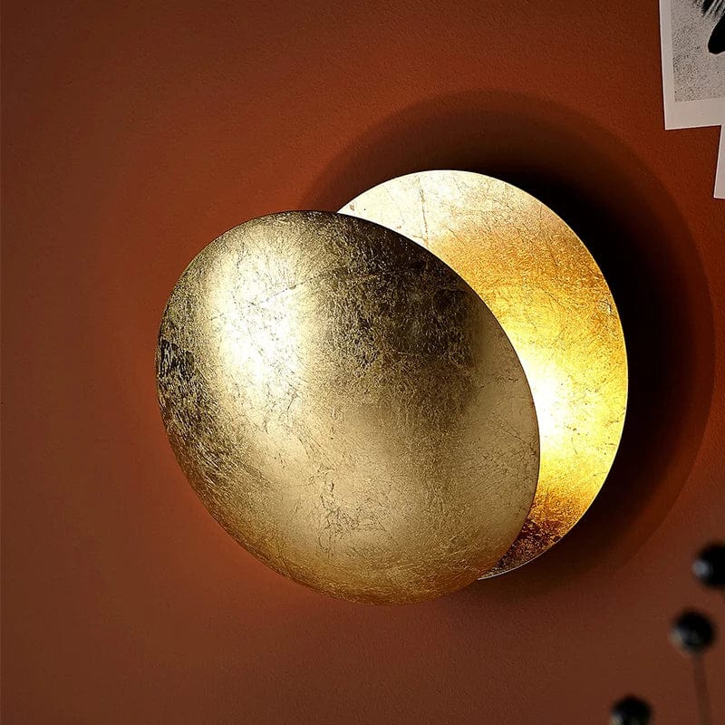 Lampada da parete per eclissi solare rotante in metallo dorato con LED