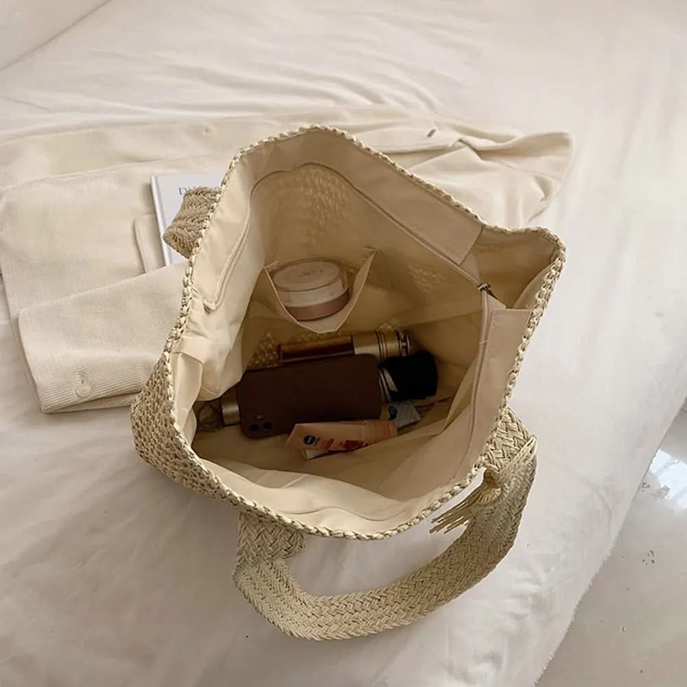 BOHOWEAVE Geflochtene Raffia-Tragetasche — Geräumige Schultertasche mit Quastendetail