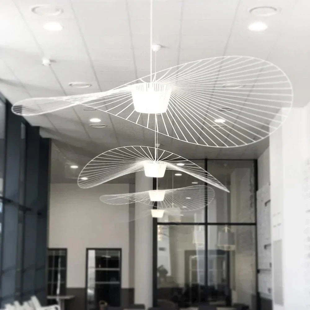 The Vexaera Chandelier That Uses Iron Fabric Elements With Art Deco Lighting Design