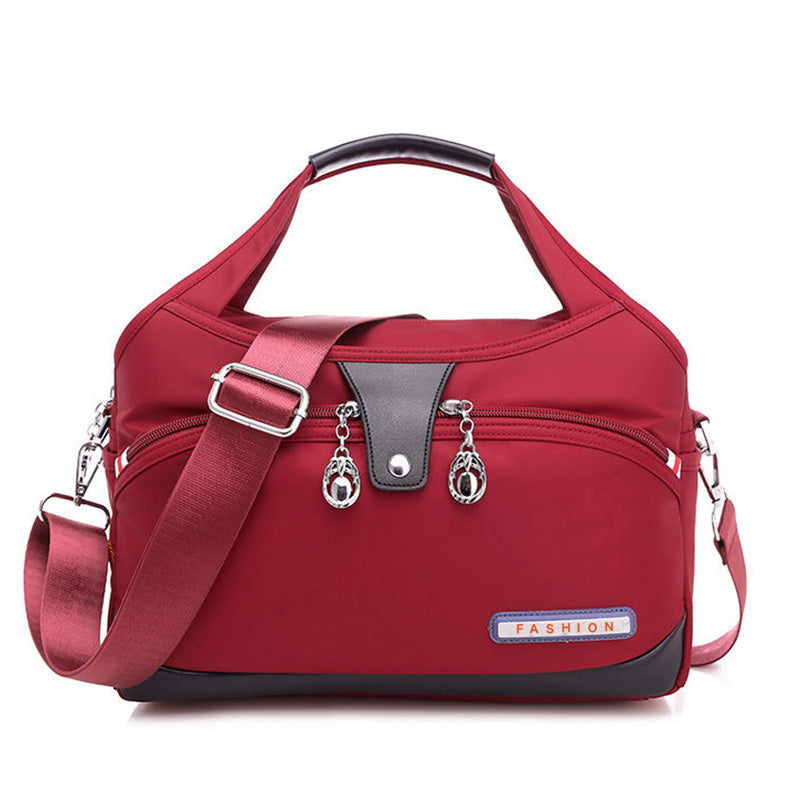 Geantă crossbody antifurt din nailon — design hidrofug, compartimente multiple, funcții de securitate ascunse