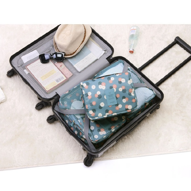 Travel Toiletry Case With Hanging Feature And Waterproof Exterior