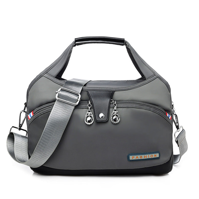 Geantă crossbody antifurt din nailon — design hidrofug, compartimente multiple, funcții de securitate ascunse