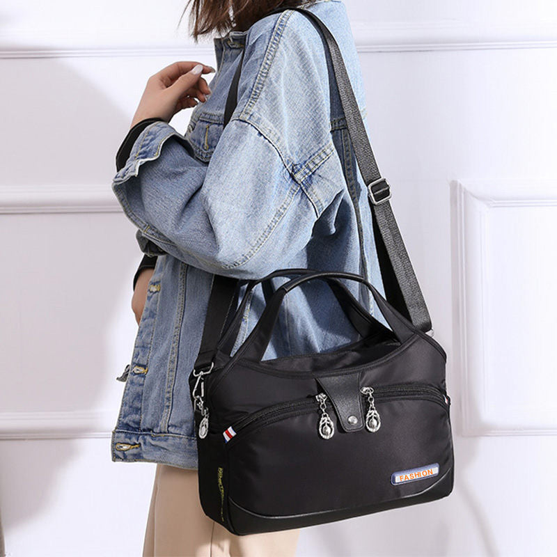 Geantă crossbody antifurt din nailon — design hidrofug, compartimente multiple, funcții de securitate ascunse