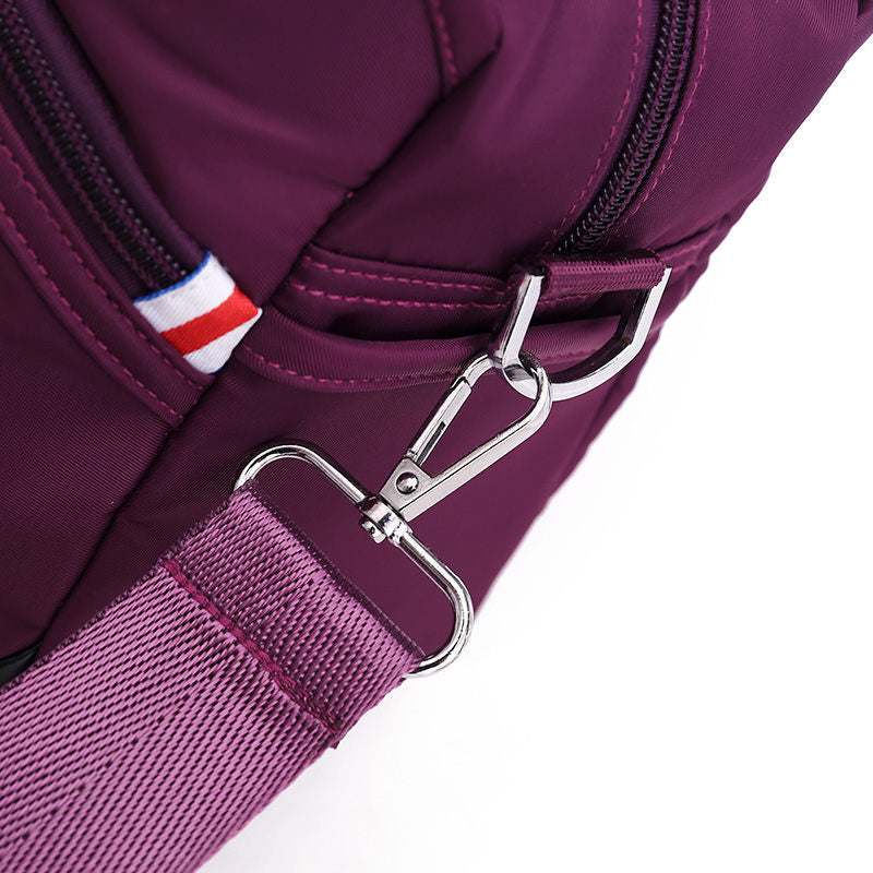 Geantă crossbody antifurt din nailon — design hidrofug, compartimente multiple, funcții de securitate ascunse