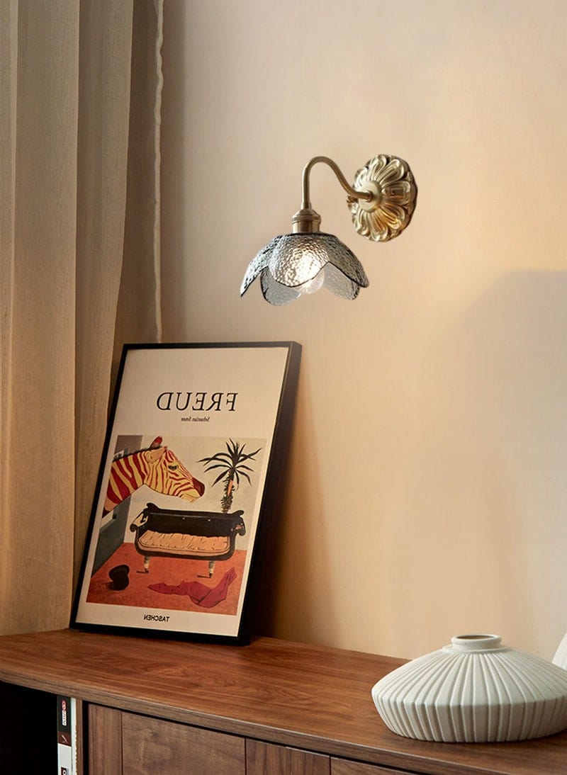 Elora Lotus Wall Light With Glass Shade That Is Seeded In Brushed Brass Finish For Interiors