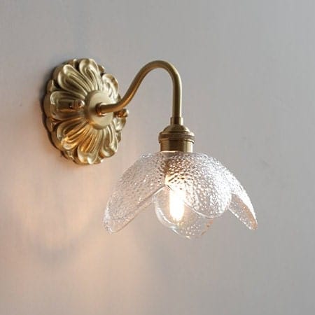 Elora Lotus Wall Light With Glass Shade That Is Seeded In Brushed Brass Finish For Interiors