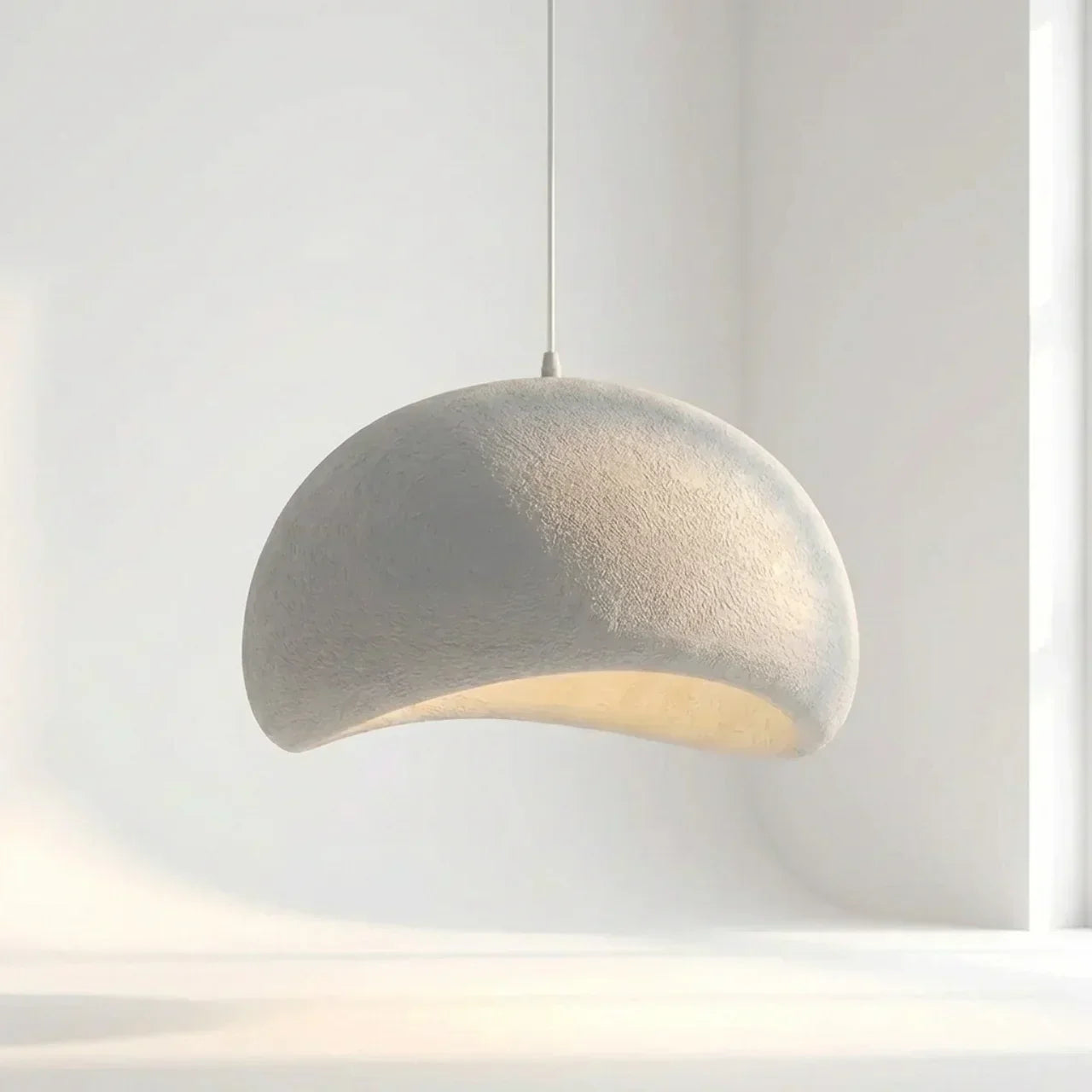 Galet Air Light Pendant With Organic Stone Inspired Form For Modern Interiors Today