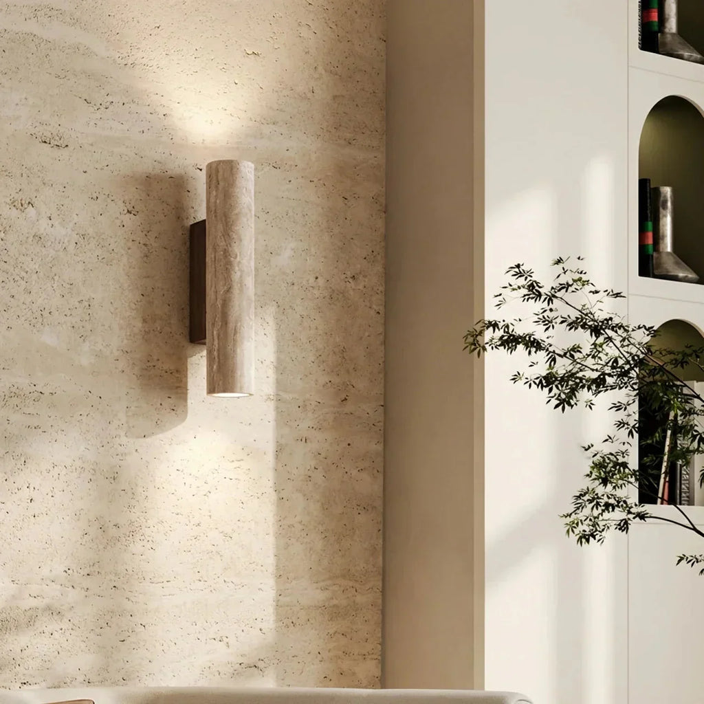 Wall Lamp In Vertical Design Using Travertine Stone With Led Lights Pointing Up And Down