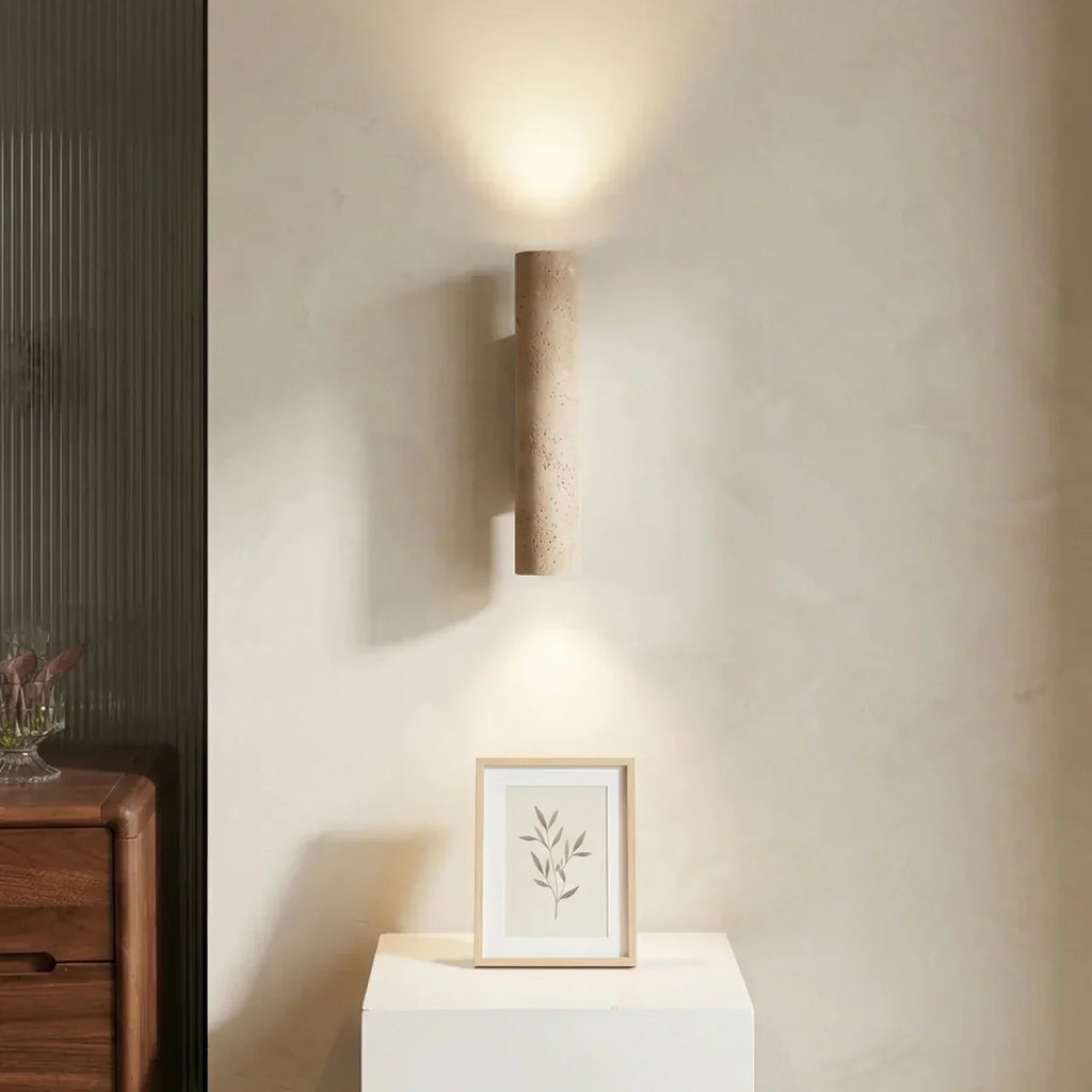 Wall Lamp In Vertical Design Using Travertine Stone With Led Lights Pointing Up And Down