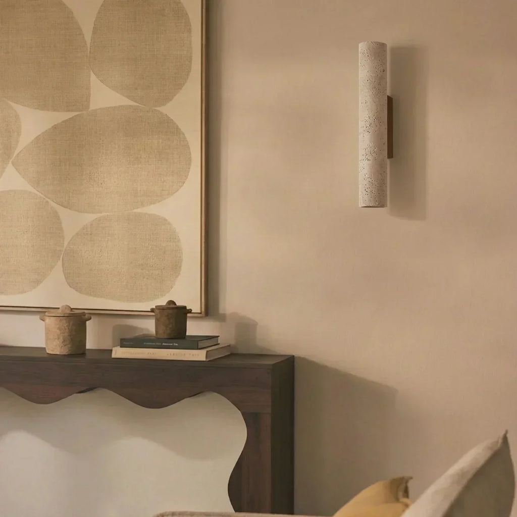 Wall Lamp In Vertical Design Using Travertine Stone With Led Lights Pointing Up And Down