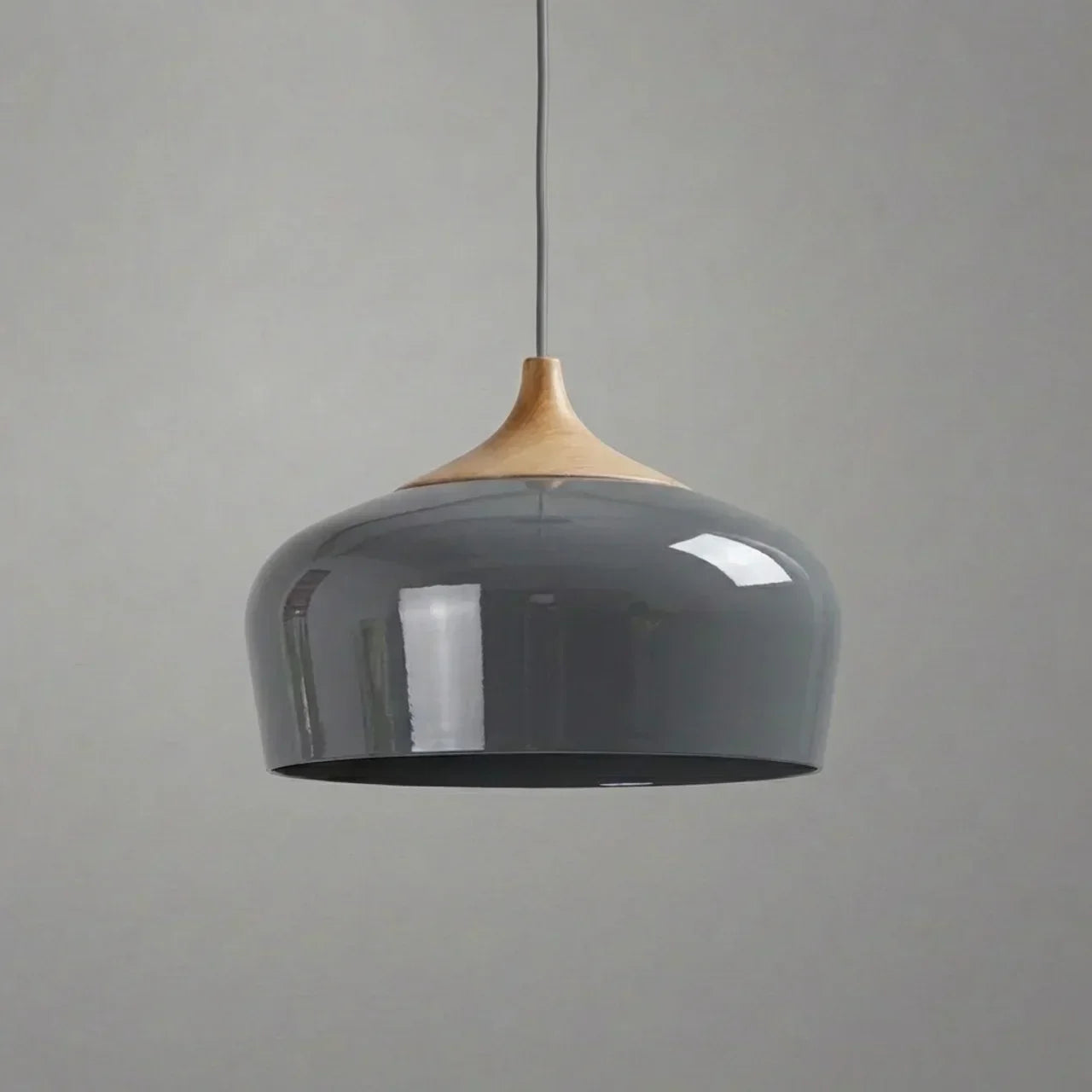 Geometric Sculptural Pendant Light With Metal Shade And Wood Accent For Modern Interiors