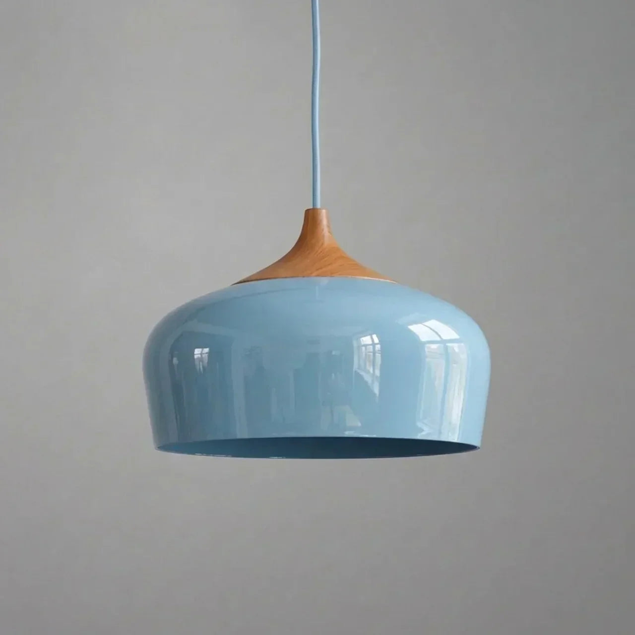 Geometric Sculptural Pendant Light With Metal Shade And Wood Accent For Modern Interiors