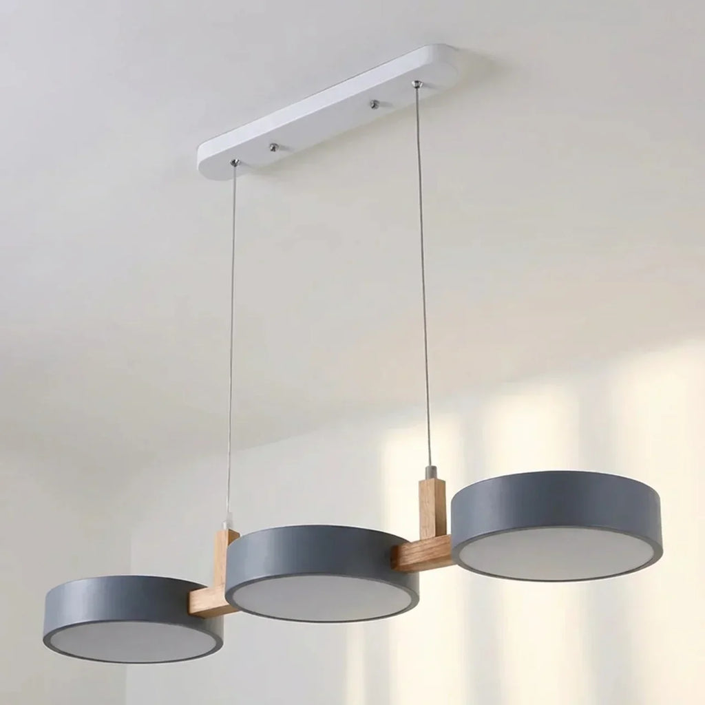 Wood Beam Pendant Light With Metal Drum Shade Array For Ceiling Installations Above Kitchen Islands