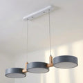 Wood Beam Pendant Light With Metal Drum Shade Array For Ceiling Installations Above Kitchen Islands