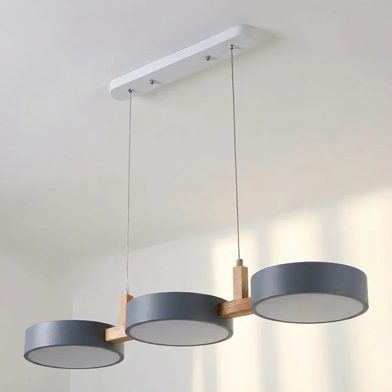Wood Beam Pendant Light With Metal Drum Shade Array For Ceiling Installations Above Kitchen Islands