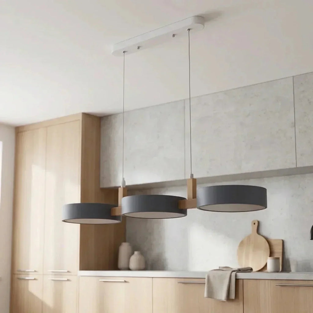 Wood Beam Pendant Light With Metal Drum Shade Array For Ceiling Installations Above Kitchen Islands