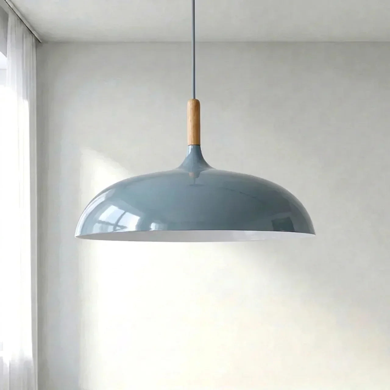 Geometric Sculptural Pendant Light With Metal Shade And Wood Accent For Modern Interiors